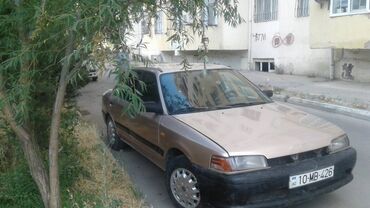 mazda oluxana: Mazda 323: 1.3 l | 1993 il Sedan