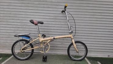 Детские велосипеды: Детский велосипед в синем цвете, оснащенный дополнительными боковыми — 13