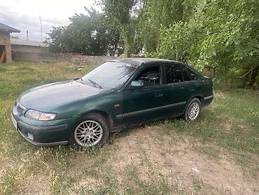 devo matiz: Mazda 626: 1999 г., 2 л, Механика, Бензин, Хэтчбэк — 3