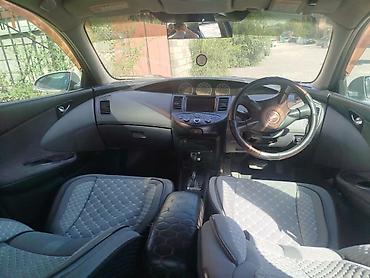 тико карапка: Nissan Primera: 2002 г., 2 л, Вариатор, Бензин, Седан — 5