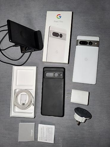 Google: Google Pixel 7 Pro, Б/у, 256 ГБ, цвет - Белый, eSIM — 1
