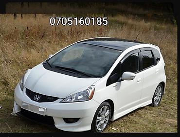 Honda Fit: 2010 г., 1.5 л, Автомат, Бензин
