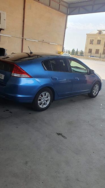 165 60 14: Honda Insight hibrid hetçbek, mavi rəngdə təqdim olunur. Avtomobilin — 8
