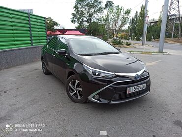Toyota Corolla: 2019 г., 1.8 л, Автомат, Гибрид, Седан
