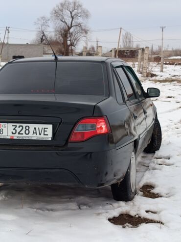 Другие автомобили: Седан чёрного цвета с тонированными стёклами. Киргизская регистрация — 1