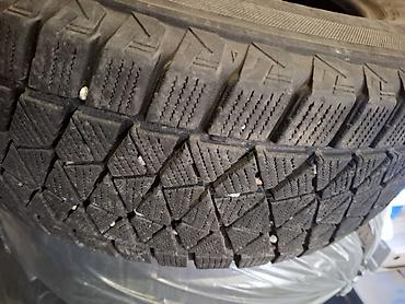 Шины: Bridgestone Blizzak DM-V2, комплект зимних шин без шипов (Studless) — 1