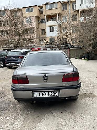 opel omega: Opel Omega: 2.5 l | 1994 il Sedan — 5
