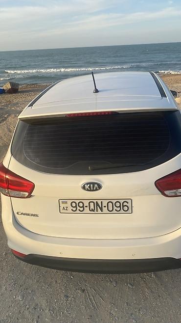 picanto kia: Kia Carens, ağ rəng, 5 qapılı kompakt MPV. Xarici: - LED gündüz — 6