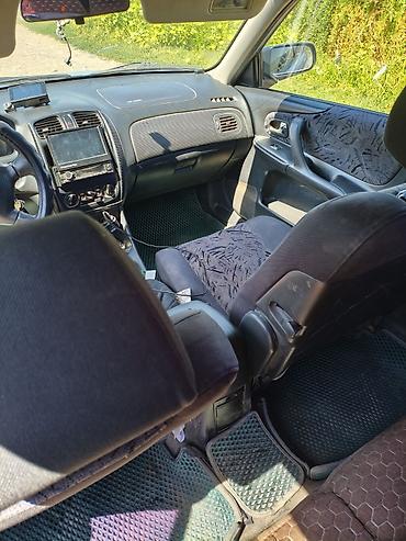 Транспорт: Mazda 323: 2000 г., 1.5 л, Механика, Бензин, Универсал — 5