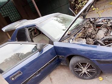 Скупка авто: Mazda 323F, хэтчбек 5 дв., темно‑синий цвет, на разбор. - Кузов: 323F — 10