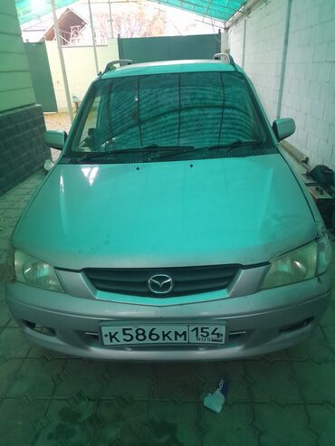 трамблёр мазда демио: Mazda Demio: 2001 г.