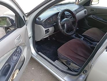 желмайан бензин: Nissan Almera: 2001 г., 1.8 л, Кол менен иштөөчү, Бензин, Седан — 5
