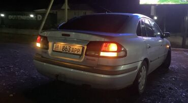 зарядные устройства для автомобиля: Mazda 626 седан, серебристый цвет, на киргизских номерах (863 APP)