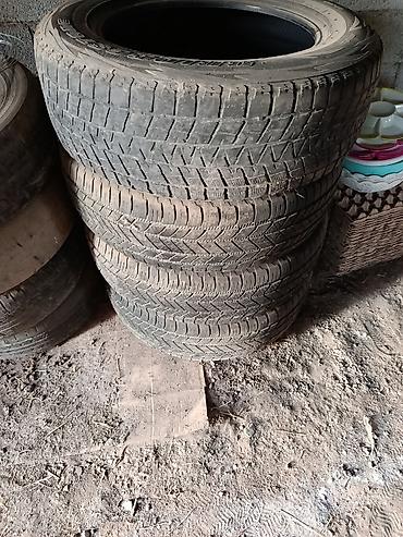 Шиналар: Зимние шины Bridgestone Blizzak - Размер: 235/65 R18 - Индекс — 2