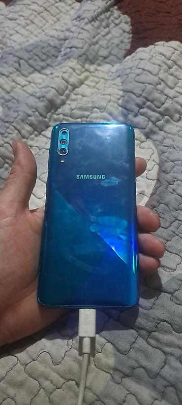 samsung a31s: Samsung Galaxy A30s (синий) - Экран 6.4", Super AMOLED, вырез — 2
