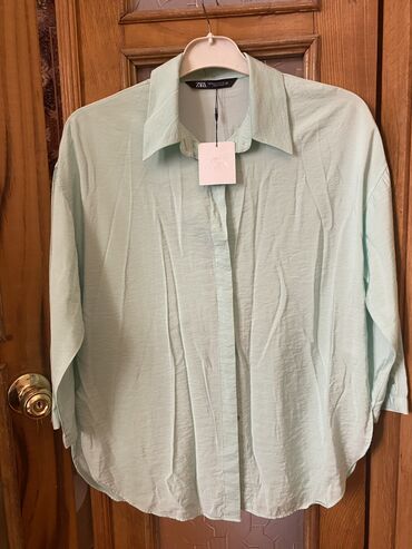 Köynək və bluzalar: Qadın geyimləri – 2 fərqli model 1) Ağ bluz: - Yumşaq, axıcı parça - — 6