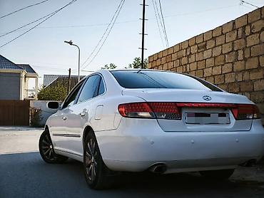 Hyundai: Hyundai Grandeur milvari biznes-sedan. Xüsusiyyətlər və avadanlıq: - — 6