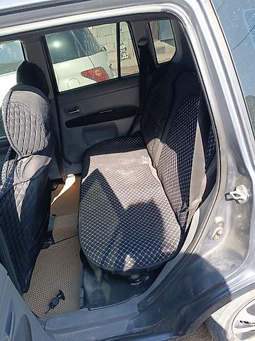 урус машина: Mazda Verisa: 2003 г., 1.3 л, Кол менен иштөөчү, Бензин, Хетчбек — 7