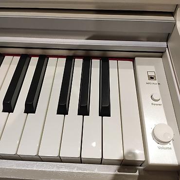 Musiqi alətləri: Elektro piano Kurzweil M 210 Polifoniya:128 Klavişlər:88 Səslər:20 — 4