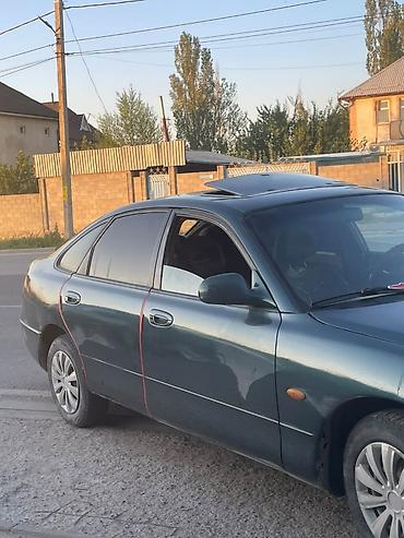 боз белер: Mazda 626: 1999 г., Кол менен иштөөчү, Седан — 5