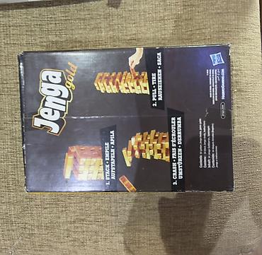 jenga: Jenga Gold — настольная игра Hasbro с «золотыми» брусками. Цена - 350 — 5