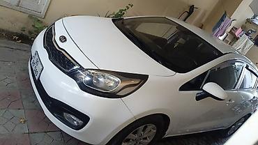 e60 guzgu: Kia Rio sedan – ağ rəng, 4 qapılı, şəhər və tras üçün qənaətcil — 5