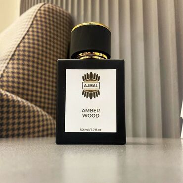 black leather parfum: Ajmal Amber Wood
