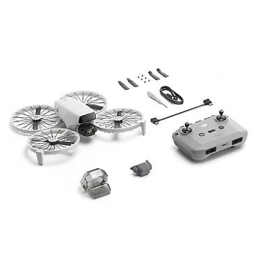Квадрокоптер DJI Flip) с защитными кожухами пропеллеров и пультом at lalafo.kg Квадрокоптер DJI Flip) с защитными кожухами пропеллеров и пультом