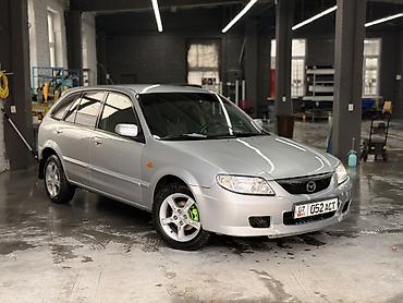 Mazda: Mazda 323: 2003 г., 1.6 л, Механика, Бензин, Универсал — 8