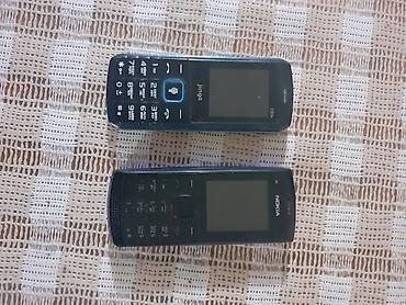 jinga telefonlari: İki düyməli mobil telefon dəsti Model və brend: - Nokia X1 - Jinga — 1