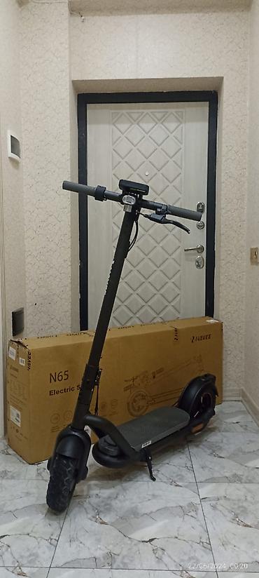 explore smart samokatlar: Navee n65 Süret:40 km/s Max çeki:120kq Gediş mesafesi:65km Problem — 1