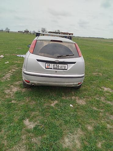 болуп: Ford Focus: 2002 г., 2 л, Кол менен иштөөчү, Бензин, Хетчбек — 5
