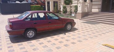 фары на нексии: Автомобиль Daewoo Nexia в кузове седан, выполненный в красном цвете