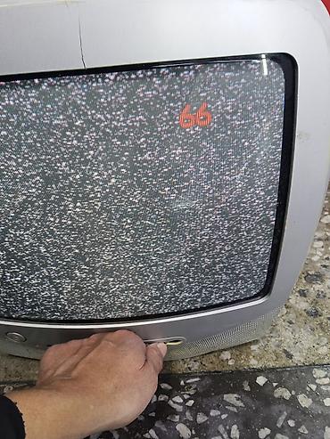 Televizorlar: Philips CRT televizor - Ekran: təxminən 14–15 düymlük əyri CRT ekran — 2
