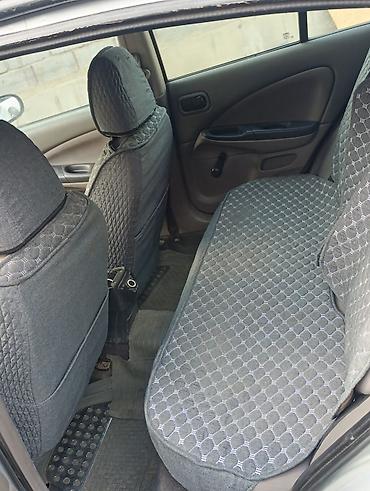 чехлы в авто: Nissan Almera: 2000 г., 1.5 л, Механика, Бензин, Хэтчбэк — 8