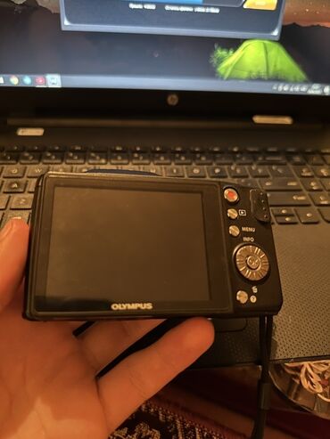 ayfon ekran sekilleri: Olympus rəqəmsal fotoaparatı. 24x optik böyütməyə malikdir. Kompakt
