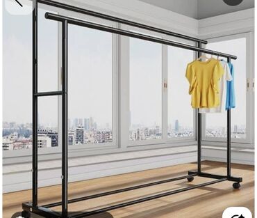 Mağaza asılqanları: Paltar asmaq üçün nəzərdə tutulmuş metal konstruksiyalı asılqan. Bu — 14