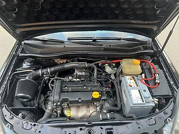 Opel: Marka/model: Opel Astra H (hatchback, 5 qapı) Rəng: qara (parlaq) — 11