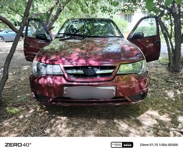опель вектора б: Бордовый седан Daewoo Nexia с четырьмя дверями, с легкосплавными
