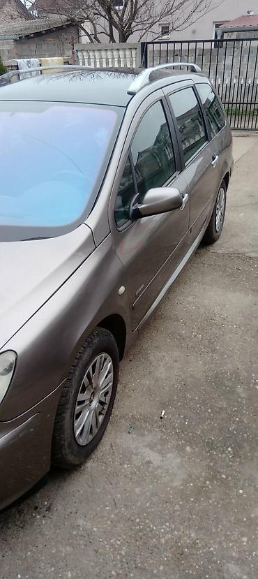 Peugeot: Peugeot 307 SW – karavan, metalik siva boja. Karakteristike i oprema — 11