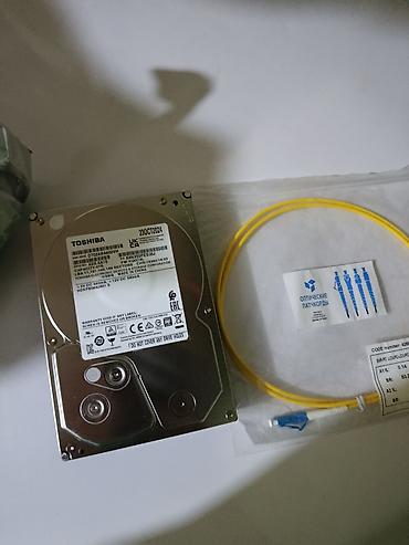 Жесткий диск 3.5" Toshiba DT02ABA600VH 6 ТБ + оптический патчкорд