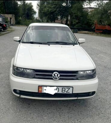 объем 1: Volkswagen Jetta: 2012 г., 1.6 л, Механика, Бензин, Седан