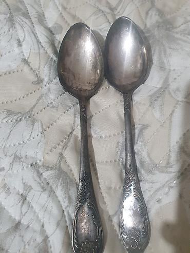 qasig: Məhsul: Naqişli metal qaşıq dəsti - Tərkib: Metal (gümüşü rəng — 2