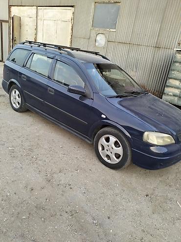 prius baqaj: Opel Astra Caravan (universal) – tünd mavi rəng. Xüsusiyyətlər: - — 2