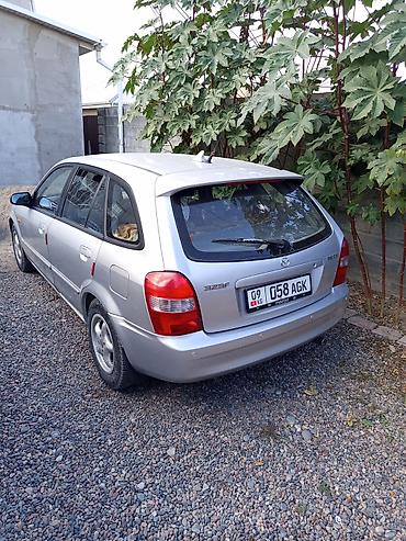 mazda premacy 1 8: Mazda Familia: 2001 г., 1.5 л, Механика, Бензин, Седан — 8