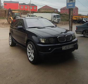 niva 4 qapili: BMW X5 (E53) – qara eksteryer, qırmızı dəri salon - Kuzov: SUV, qara — 1