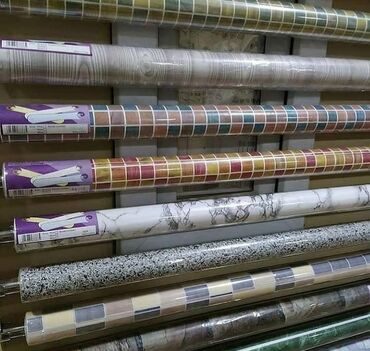 Döşəmə: Rulonunda uzunlugu 10 metr eni 90sm olur,arxasi ozu kleylidir. Vinil
