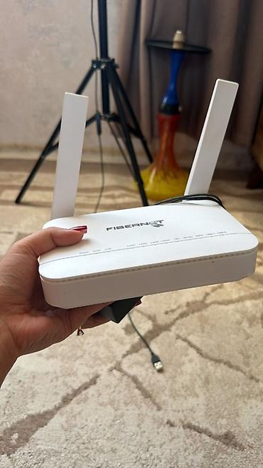 sim internet paketleri ayliq: İki antenalı Fibernet Wi‑Fi router - Brend/model: Fibernet (üzərində — 1