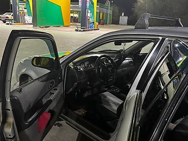 Mazda: Mazda 323: 2003 г., 1.6 л, Ручные, Бензин, Универсал — 8