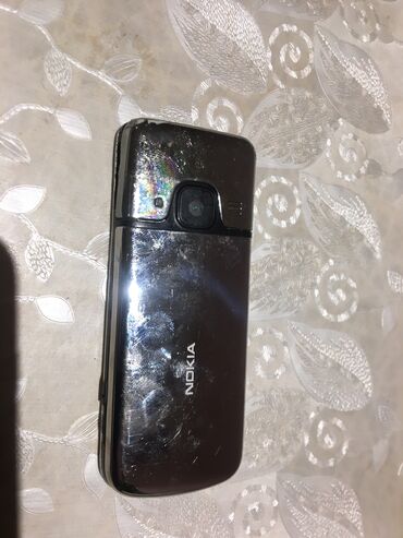 ���������������� ���������� 6700: Nokia 6700 Slide цвет - Серебристый